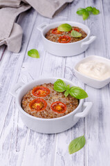 Buckwheat casserole with tomatoes