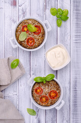 Buckwheat casserole with tomatoes