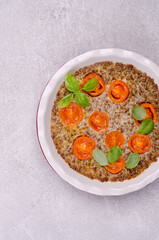 Buckwheat casserole with tomatoes