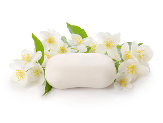 Soap bar and jasmine flowers on white background