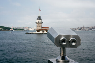 A viewing binoculars of telescope looking at the maiden's Tower