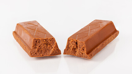 chocolate pieces isolated on white