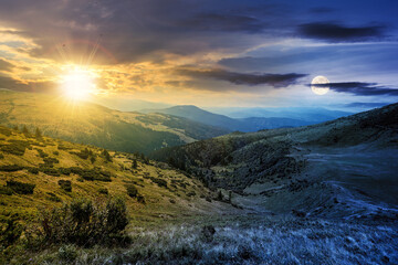 day and night time change concept above carpathian mountain landscape. beatiful scenery with green...