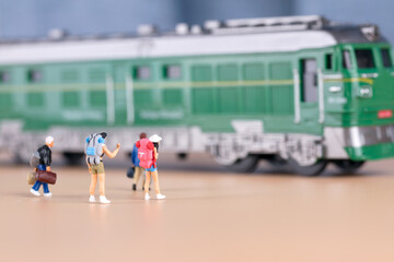 The crowd waiting to board the train in a miniature world