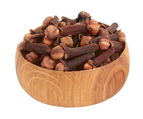 Dry spice cloves in wooden bowl isolated on white background with clipping path and full depth of...