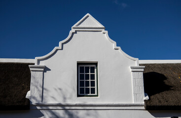 The front view of part of an old house
The front view of part of an old house showing the classic gable

