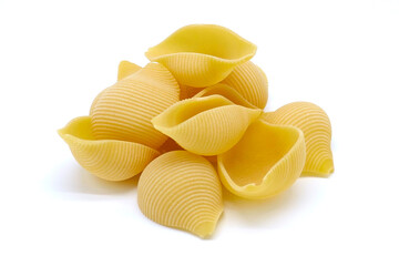 Conchiglioni Rigati pasta shells Raw pasta with ingredients for cooking Spaghetti pasta isolated on...