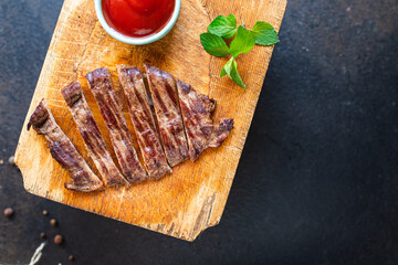 beef steak juicy meat grilled barbecue B-B-Q on the table, healthy meal snack copy space food background rustic top view 