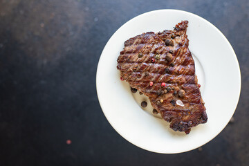 beef steak juicy meat grilled barbecue B-B-Q on the table, healthy meal snack copy space food background rustic top view 