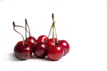 Red ripe sweet cherry on an isolated background. 