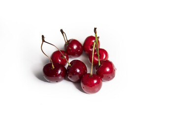 Obraz na płótnie Canvas Red ripe sweet cherry on an isolated background. 