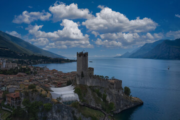The historic town of Malcesine on Lake Garda, Italy. Castle of Malcesine, panorama aerial view.