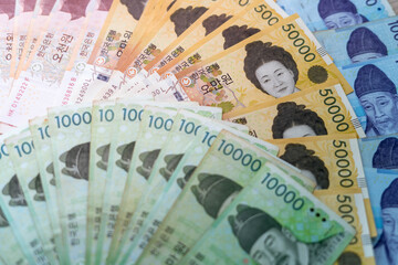 Korean currency . Bank notes and coins used as a medium of exchange. Stimulate production and help...