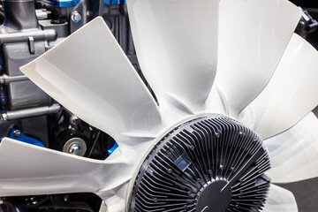 engine cooling fan, which blows the radiator, as well as the heated engine motor