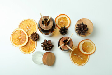 Diffusers, lemons and cones on white background