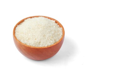 Sugar with a wooden bowl isolated on a white background