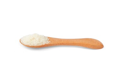 Granulated sugar with a wooden spoon on a white background