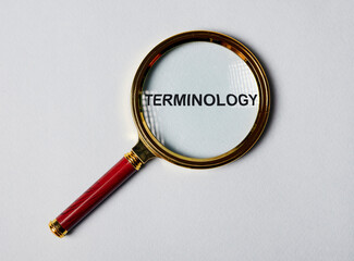 Terminology text through magnifying lens, top view