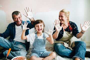 Happy family renovating their house
