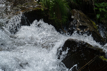 water flowing over rocks