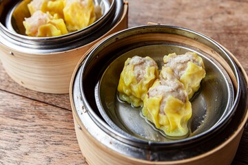 Chinese breakfast dumplings stuffed with crab in a wooden container