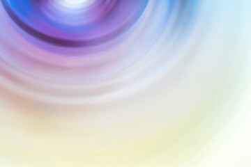 Abstract blurred background with rotating turbulent vortex. Shimmering multi-colored slide cover...