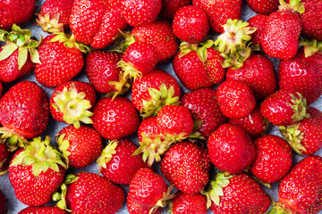 background Juicy ripe strawberries. Sweet healthy dessert, vitamin harvest. close up.