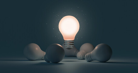 Glowing idea light bulb and innovation thinking creative concept on success inspiration dark...