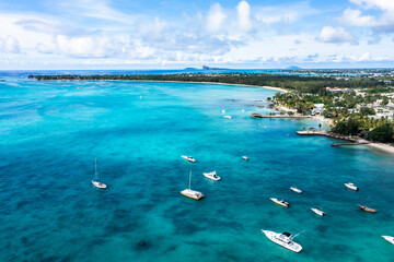 Aerial view, beaches with luxury hotels with water sports at Trou-aux-Biches Pamplemousses Region,...