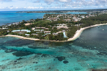 Aerial view, beaches with luxury hotels with water sports at Trou-aux-Biches Pamplemousses Region,...