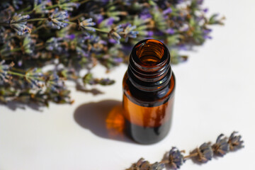 Lavender essential oil close-up. Natural cosmetic for face and body. Aromatherapy. Selective focus