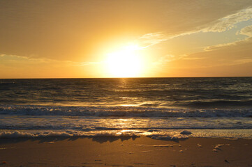 Beautiful golden sunset on Naples beach, South Florida, USA