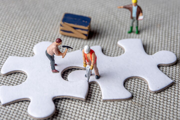 solving problems fiting together of empty puzzle pieces