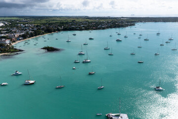 Aerial view, beaches with luxury hotels with water sports and boats at Trou-aux-Biches Pamplemousses Region, Mauritius, Africa