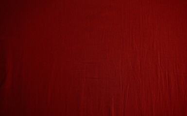 Stofftextur in rot mit Falten als Hintergrund