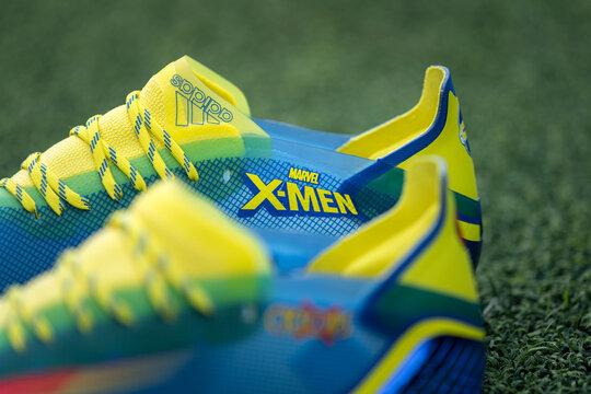 Thailand - June 2021 : Adidas launch football boots"X Ghosted.1 Cyclops" which is the special edition that collab with "Marval X-Men". Sport object equipment, close-up in detail and selective focus.