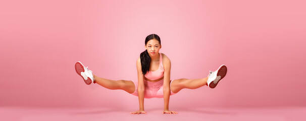 12-15 years old Asian Youth stretch lift up her flexible leg full length