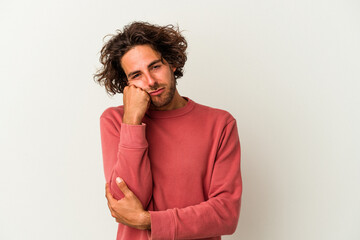 Young caucasian man isolated on white background who feels sad and pensive, looking at copy space.