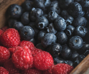 Closeup of fresh bluberries and raspberries