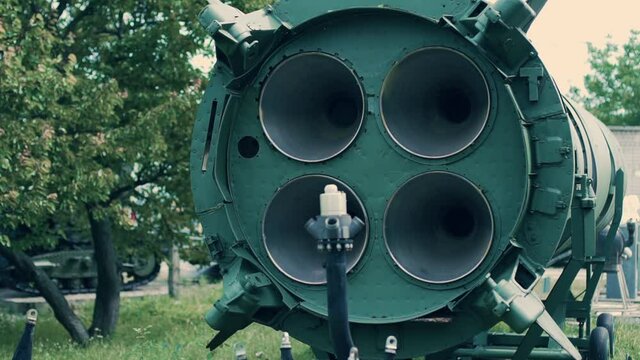 Metal part of the engine of a nuclear warhead. Soldiery. Missile troops. Installation of the rocket engine mechanism. Metal details.