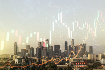 Multi exposure of virtual abstract financial graph hologram and world map on Los Angeles cityscape background, financial and trading concept