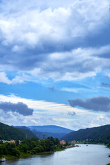 View over river Elbe in Germany near Bad Schandau near Czech border with dramatic sky