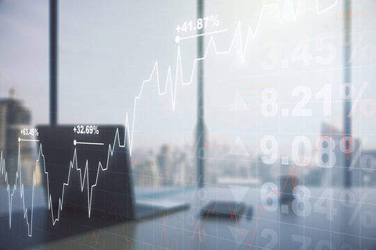 Multi exposure of abstract financial graph and modern desktop with pc on background, financial and trading concept