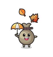 cartoon of the cute money sack holding an umbrella in autumn