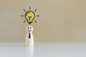 Wooden doll people human women standing with light bulb icon idea, intelligent think power,...