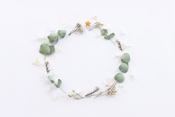 Top view image of flowers composition on white background .Flat lay