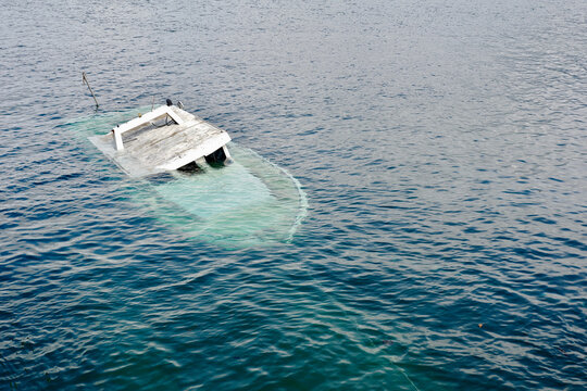 Power boat sinked in the sea coast of Hondarribia, Basque country, Spain.