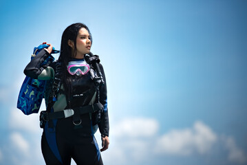 asian woman in scuba diving gear.