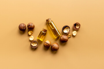 Macadamia essence oil with macadamia nuts. Organic product for food or cosmetic