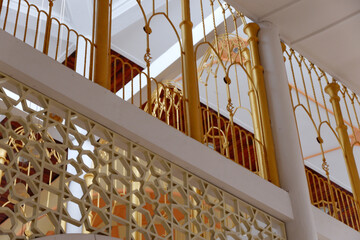 Beautiful indoor balcony design with wrought iron railings